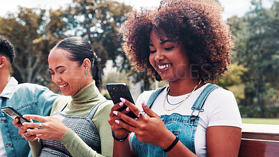 Buy stock photo Phone, students and friends at park for connectivity, social media or learning at university. Mobile, group and happy people at college campus for education app, networking online or text message