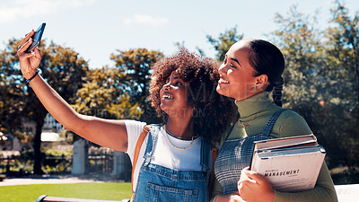 Buy stock photo Education, selfie and smile with women outdoor on college campus for memories or social media. App, books and photograph with happy student friends at university for profile picture post or update