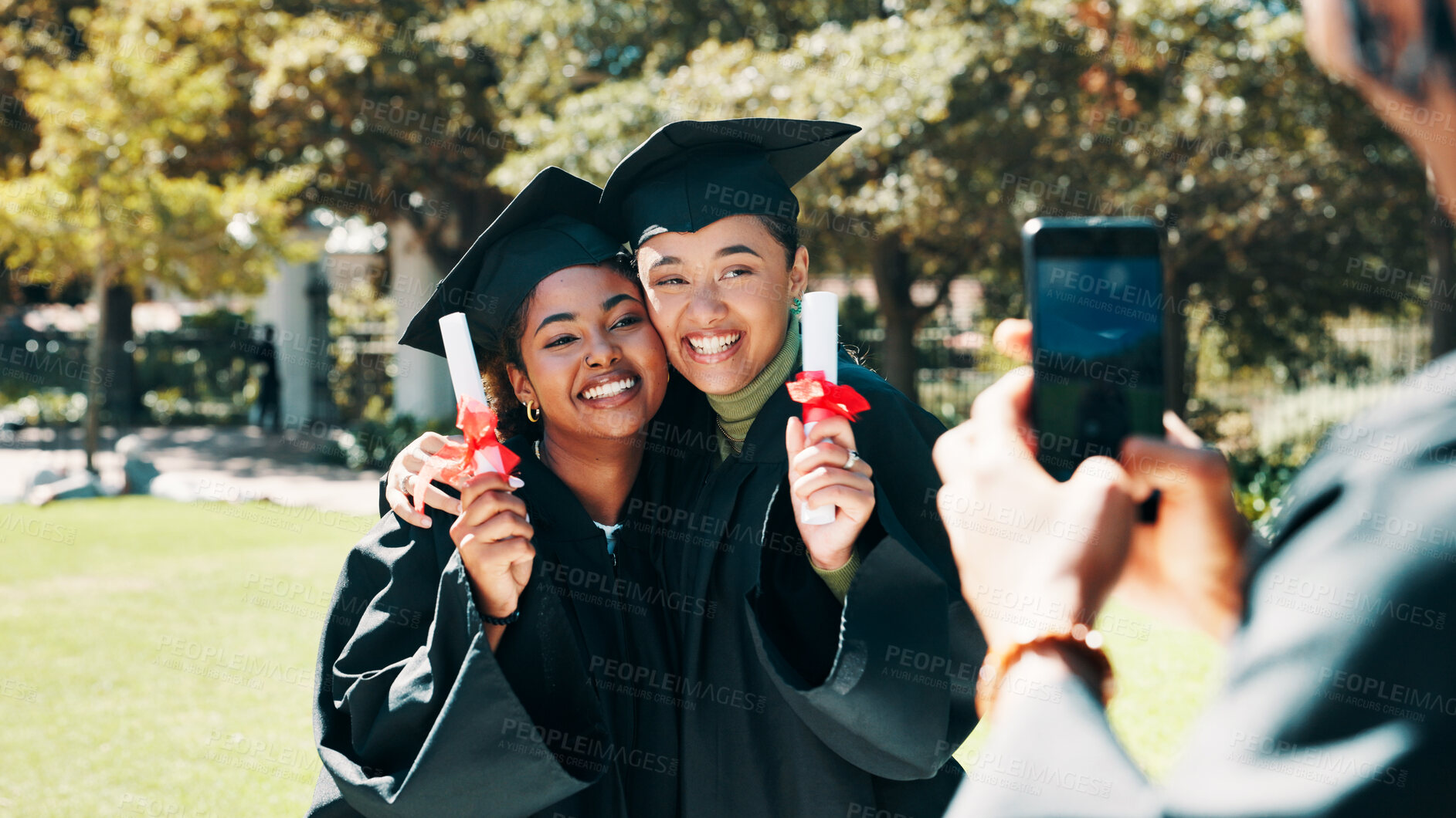 Buy stock photo Happy woman, student or picture with phone for graduation, celebration or certificate on campus. Female people, graduates or friends hug with smile, degree or diploma for photography or memory