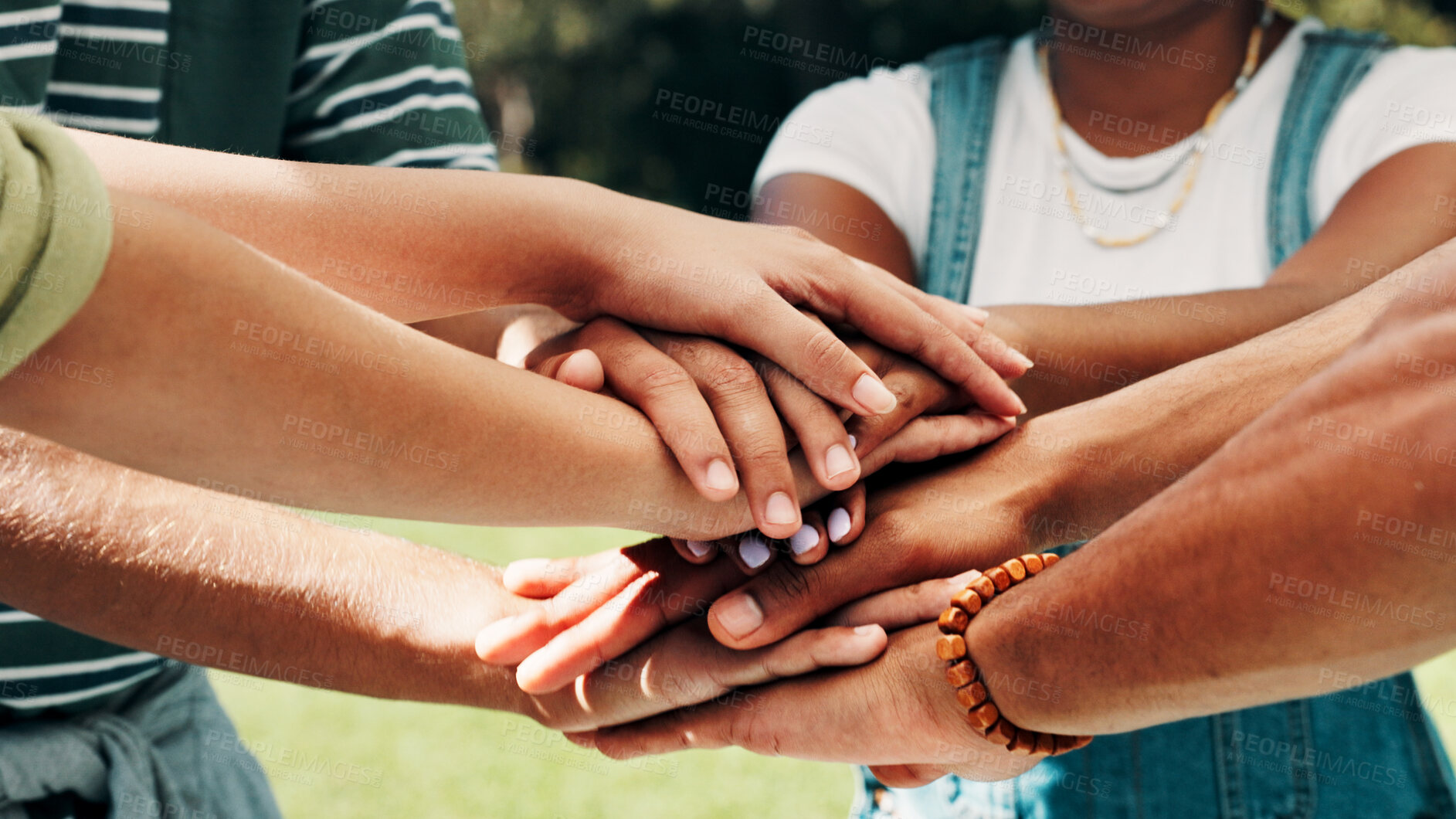 Buy stock photo Hand stack, motivation and solidarity with friends on campus together for education or success. Celebration, huddle and unity with group of students outdoor at college or university for learning
