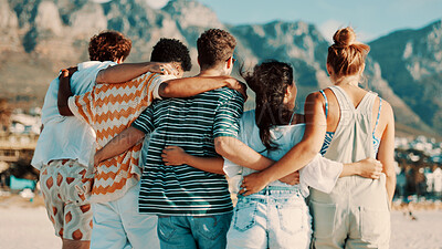 Buy stock photo People, friends and back view with hug on beach for summer vacation, bonding or outdoor fun. Group, community or embrace with sunshine on ocean coast for travel, holiday or weekend together in nature