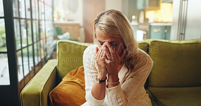 Buy stock photo Crying, woman and sad on couch in home, grieving and unhappy with breakup, mental health or emotions. Overwhelmed, tears and person with depression in lounge, grief and stress for divorce in house