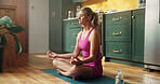 Woman, yoga and lotus meditation in home, breathing exercise and wellness in kitchen. People, zen and mudra with eyes closed for holistic fitness, routine and yogi on floor in morning at apartment