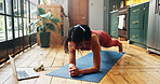 Woman, pilates and online tutorial with laptop in home for exercise, wellness or health tips. Active, female person or plank with computer on mat for virtual class, yoga or fitness guide in house