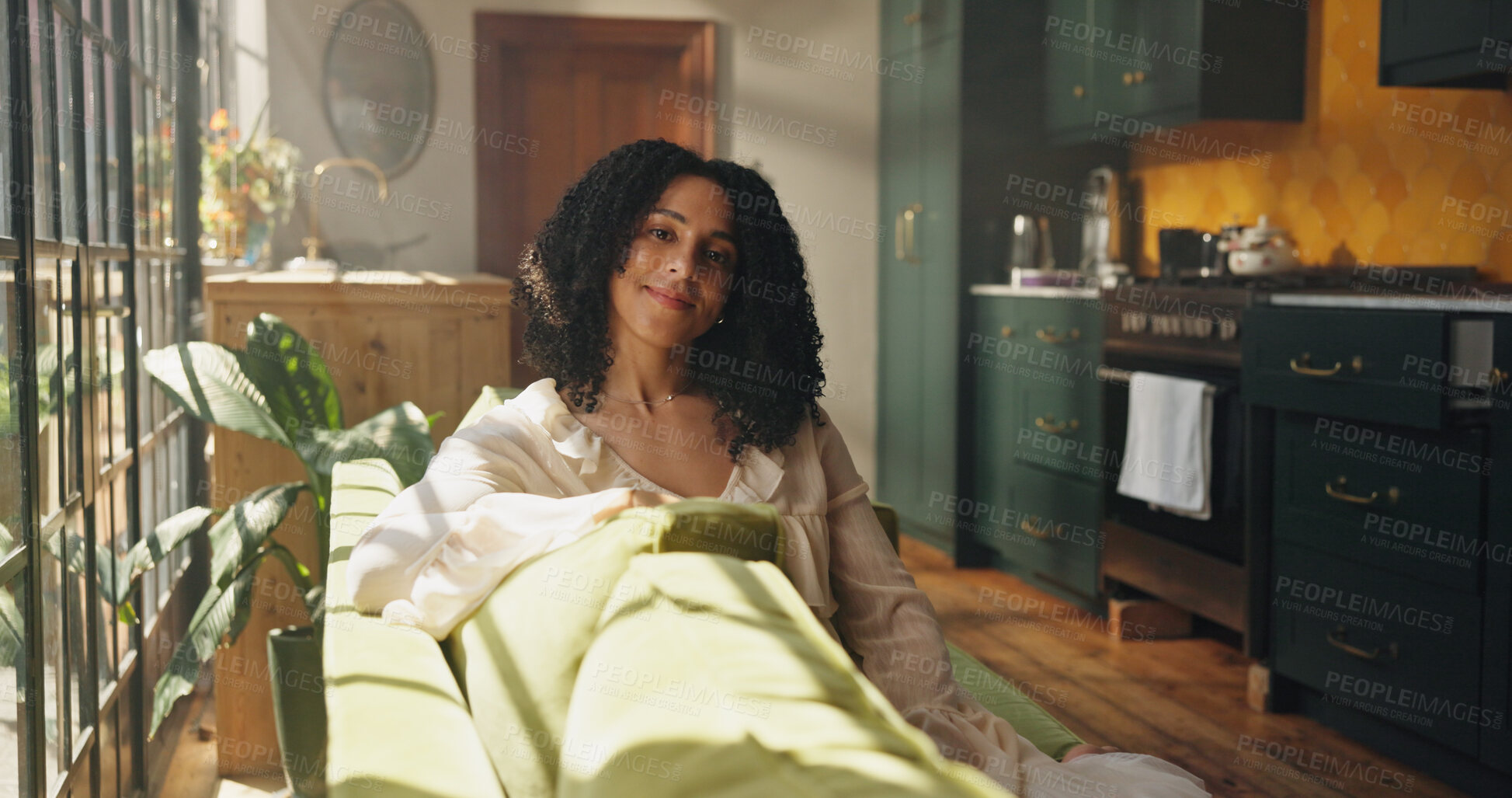 Buy stock photo Happy, relax and portrait of woman on sofa in home with calm, peace and morning break on weekend. Smile, positive attitude and female person on couch in living room for comfort in apartment in Mexico