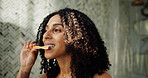 Dental hygiene, bamboo and woman brushing teeth in home for gum care, fresh breath and eco friendly. Toothbrush, clean and African person in bathroom for gingivitis prevention or sustainable wellness