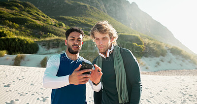 Buy stock photo Outdoor, smartphone and men with exercise, internet and online reading with communication. People, fitness and friends with cellphone, network and sand with social media and app to track progress