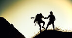 Hiking, silhouette or people on cliff with support, together or motivation for exploration goals. Adventure, journey or friend on mountain with climb, endurance or helping hand for trekking milestone