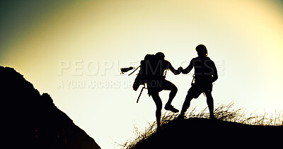 Buy stock photo Hiking, silhouette or people on cliff with support, together or motivation for exploration goals. Adventure, journey or friend on mountain with climb, endurance or helping hand for trekking milestone