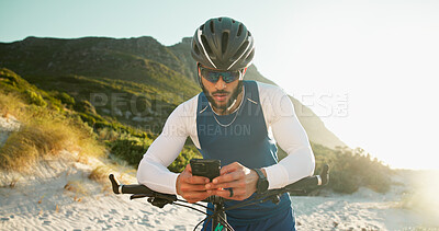 Buy stock photo Fitness, cyclist and man with phone in nature for networking, chatting or connectivity with training. Sports, cycling and athlete with cellphone for texting, communication or contact on mobile app.