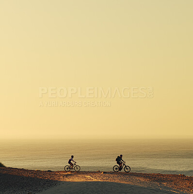 Buy stock photo People, cycling and mountain bike with beach view for outdoor journey or adventure in nature. Cyclist, friends or fitness with bicycle on mockup space by ocean for extreme sport, exercise or travel