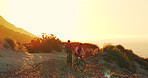 Fitness, friends and cycling at beach with mountain bike, balance and exercise at sunset. Men, bicycle and cyclists together by ocean outdoor for cardio workout, health and travel with mockup space