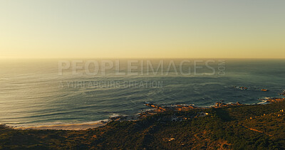 Buy stock photo Ocean, scenery and water in nature, outdoor and travel destination with space, environment and waves. Beach, sunset and aerial view on vacation location, greenery and sustainability of vegetation