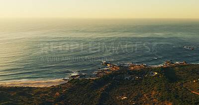 Buy stock photo Ocean, rocks and above with waves, landscape and sky with nature, environment and beach by hill. Sea, horizon and drone view for marine ecosystem, conservation or sustainability with space in summer