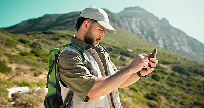 Buy stock photo Outdoor, hiking and man with cellphone, reading and navigation with app for direction. Healthy person, traveller and hiker with smartphone, location or destination with browsing route or trekking map