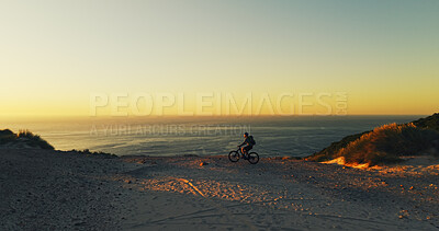 Buy stock photo Man, cycling and mountain bike with beach sunset for outdoor journey or adventure in nature. Active, male person or cyclist with bicycle, ocean view or mockup space for ride, exercise or travel