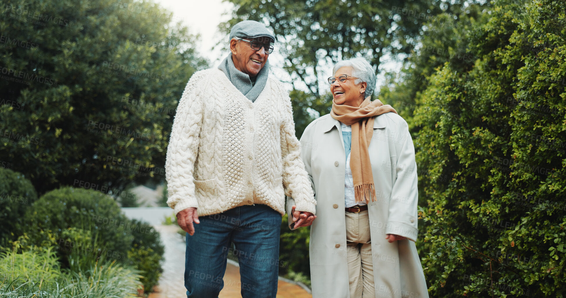 Buy stock photo Holding hands, walking and senior couple in nature with bonding together on holiday, getaway or adventure. Happy, support and elderly man with woman outdoor for connection, love or marriage in park.