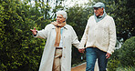Holding hands, walking and senior couple in garden with bonding together on holiday, getaway or adventure. Happy, support and elderly man with woman outdoor for connection, love or marriage in nature