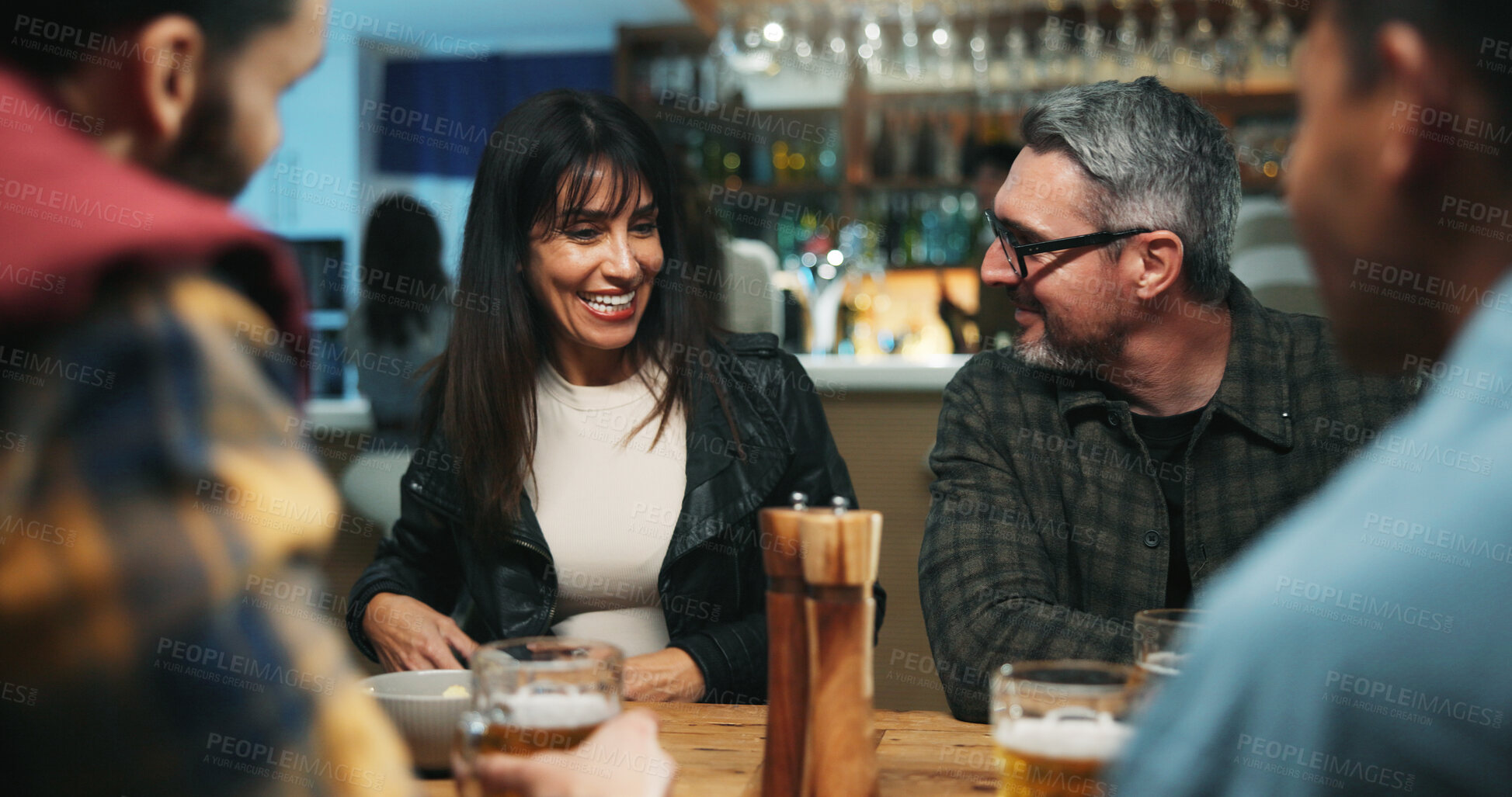 Buy stock photo Conversation, friends and people in pub, smile and bonding together with reunion. Group, men and woman in restaurant, discussion and laughing with joke, humor and social gathering with happiness