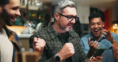Buy stock photo Phone, cheering and men in pub for sports game with goal, victory or winning championship. Happy, cellphone and group of male friends with celebration for watching football match in bar together.