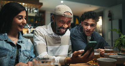 Buy stock photo Cellphone, people and friends in pub, talking and social media with communication. Men, woman and smartphone with internet, connection and app with website info, funny meme and reunion with network
