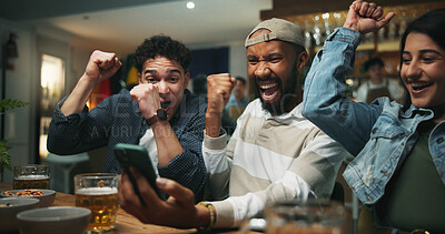 Buy stock photo Cellphone, cheering and men in pub for sports game with goal, victory or winning championship. Happy, phone and group of male friends with celebration for watching football match in bar together.