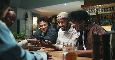 Buy stock photo Relax, friends and drinks with phone in pub for streaming sports match, live broadcast and bonding. Football fans, people or smartphone with beer in bar for watching online game, support or night out