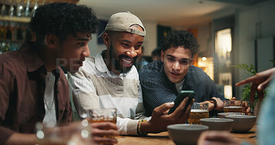 Buy stock photo Smartphone, people and friends in pub, beer and social gathering with communication. Happy men, alcohol and cellphone with network, connection and app with website info, reunion and conversation