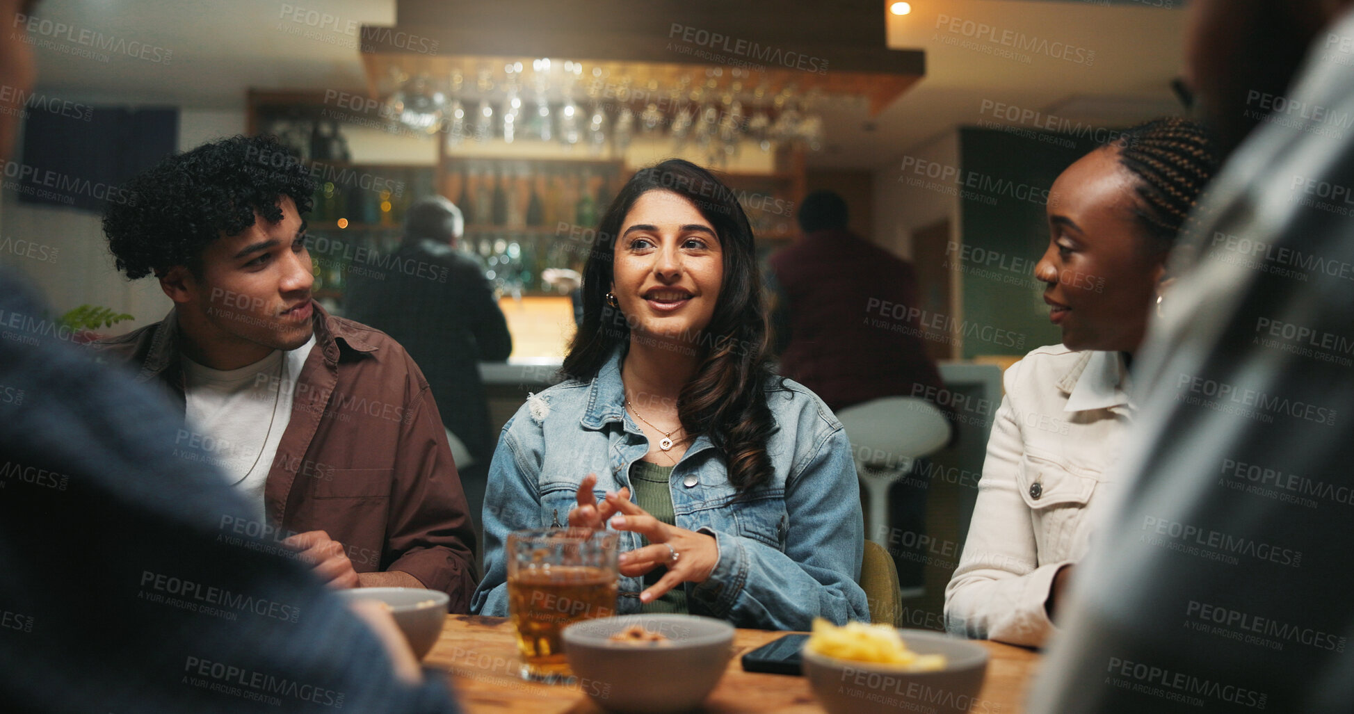 Buy stock photo Conversation, friends and people in pub, alcohol and bonding together with reunion. Group, men and women in restaurant, discussion and laughing with joke, beverage and social gathering with happiness