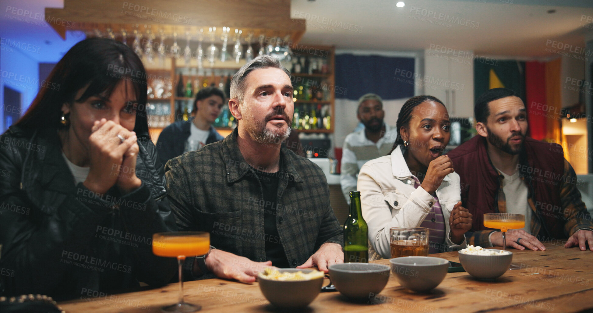 Buy stock photo Stress, watching tv and people in pub for sports game with championship for entertainment together. Anxiety, live streaming and group of friends with football match in bar for online tournament.