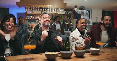 Buy stock photo People, friends and celebration at sports bar, watching tv or fist pump for goal in soccer competition. Men, group and women with cheers, football match or live stream for international game at pub