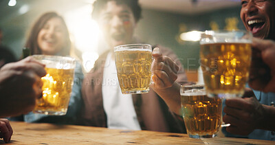 Buy stock photo Hands, friends and cheers with beer at pub for world cup win, football match celebration or bonding. Happy hour, group and people with drinks toast in bar for sports game success, night out and flare