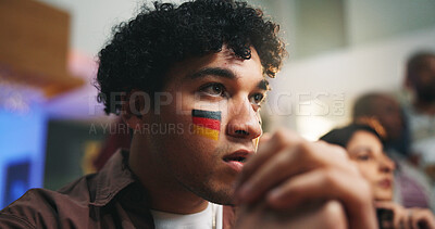 Buy stock photo Sports, face paint and man in pub with suspense for score, waiting for goal and live streaming game. Bar, friends and people for team support, broadcast and match for social gathering in restaurant