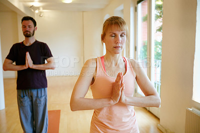 Buy stock photo Yoga, people and prayer hands in class with meditation for inner peace, chakra healing and wellness. Zen, group and mudra in gym studio with namaste pose for serenity, holistic health or mindfulness.