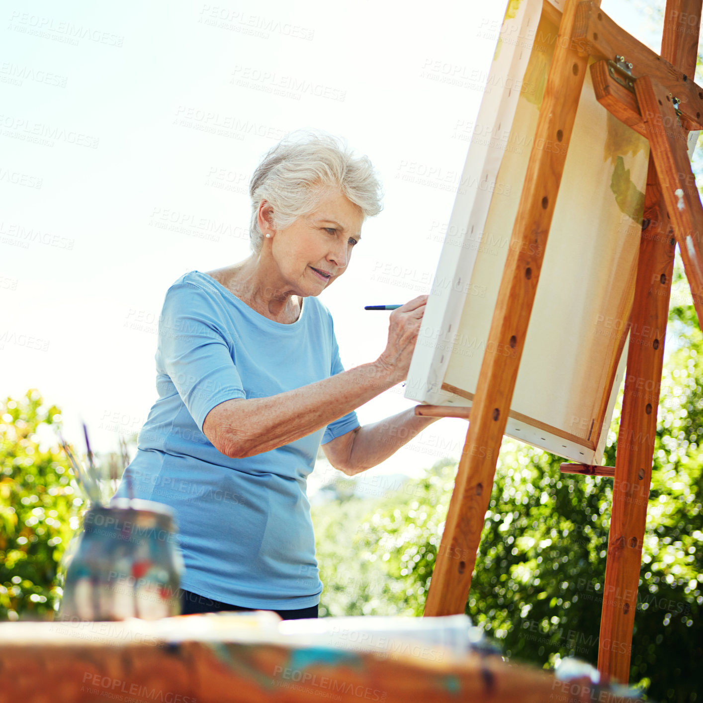 Buy stock photo Painting, canvas and talent with old woman in nature for creative project, inspiration and garden drawing. Retirement, artist and easel with senior person outdoor for botanical artwork and low angle