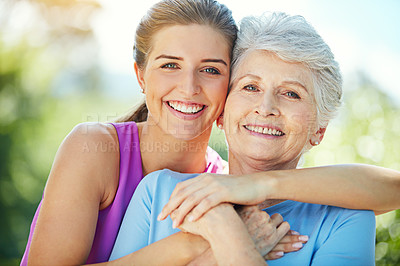 Buy stock photo Fitness, portrait or senior woman with daughter for hug in park, support or mobility in retirement health. Outdoor workout, connection or happy people embrace for care, love or wellness in exercise
