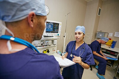 Buy stock photo Surgeon, team and woman with documents in emergency room at hospital, review schedule and report. Doctor, medical staff and paperwork with advice, feedback or operation checklist in theater at clinic