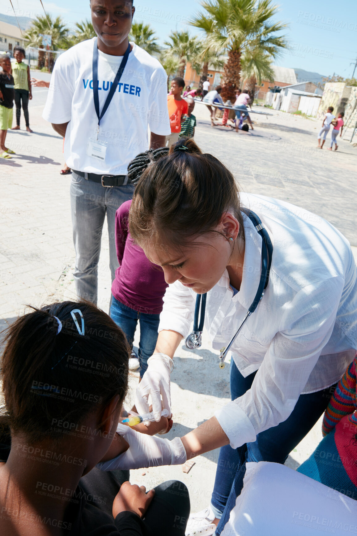 Buy stock photo Volunteer, doctor and injection with community outreach, medicine and accountability for wellness. People, kids and pediatrician with needle, charity or vaccine with social responsibility at park