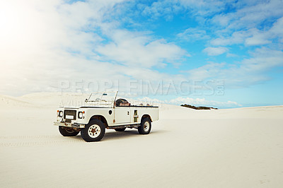 Buy stock photo Sand dunes, blue sky and pickup truck outdoor for vacation at destination, getaway or road trip. Transport, travel and vehicle at summer location for holiday, adventure or weekend break with journey.