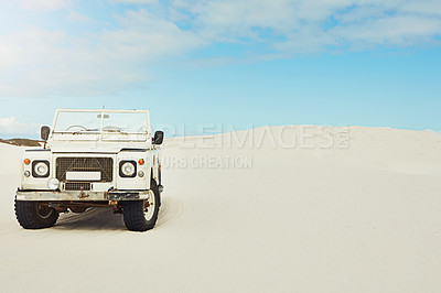 Buy stock photo Sand dunes, blue sky and pickup truck in nature for road trip at destination, getaway or vacation. Transport, travel and vehicle at summer location for holiday, adventure or weekend with journey.