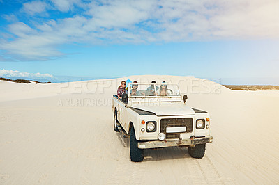 Buy stock photo Road trip, friends and people with truck in desert, travel holiday journey and driving on sand dunes. Outdoor adventure, bonding and group with space in vehicle, vacation or summer getaway in Dubai
