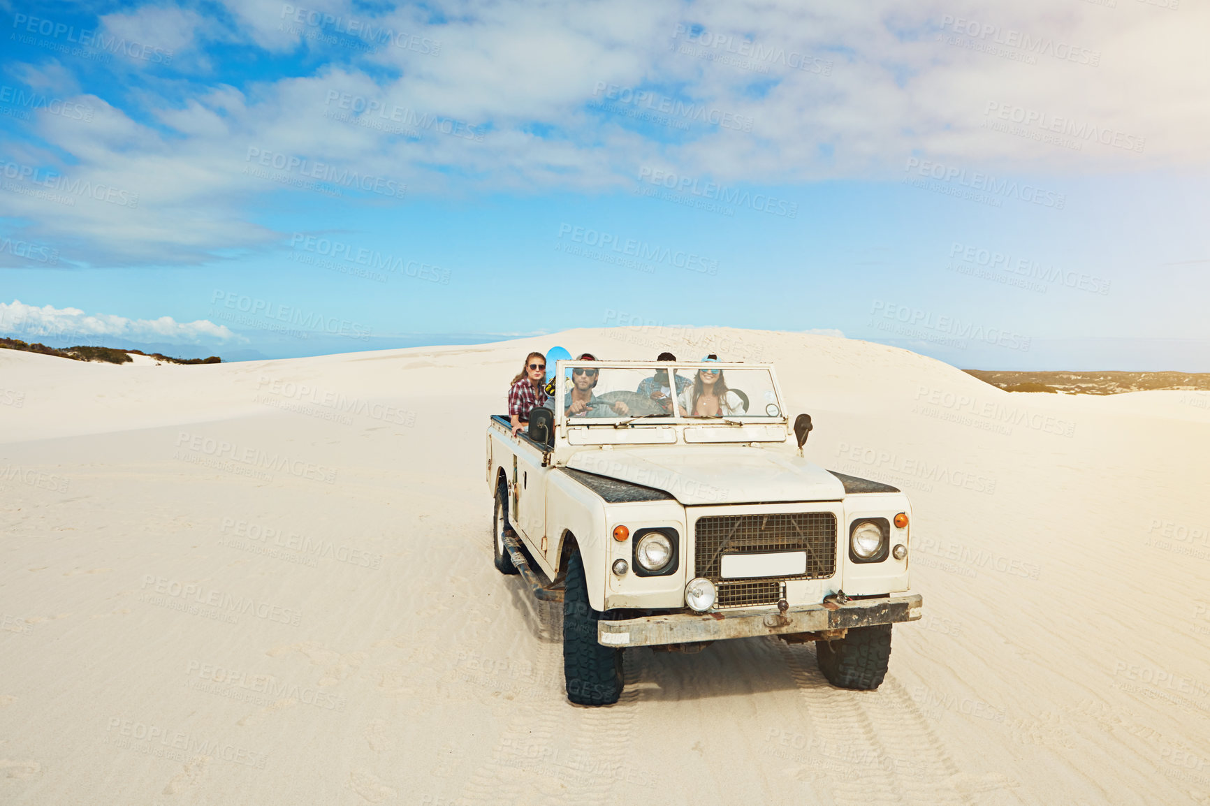 Buy stock photo Road trip, friends and people with truck in desert, travel holiday journey and driving on sand dunes. Outdoor adventure, bonding and group with space in vehicle, vacation or summer getaway in Dubai