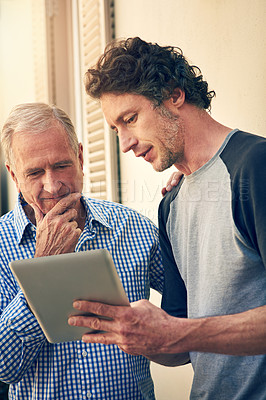Buy stock photo Senior father, man and help with tablet for internet search, learning and support at home. Family, old dad or mature son with digital tech for teaching, app guidance or solution for streaming service