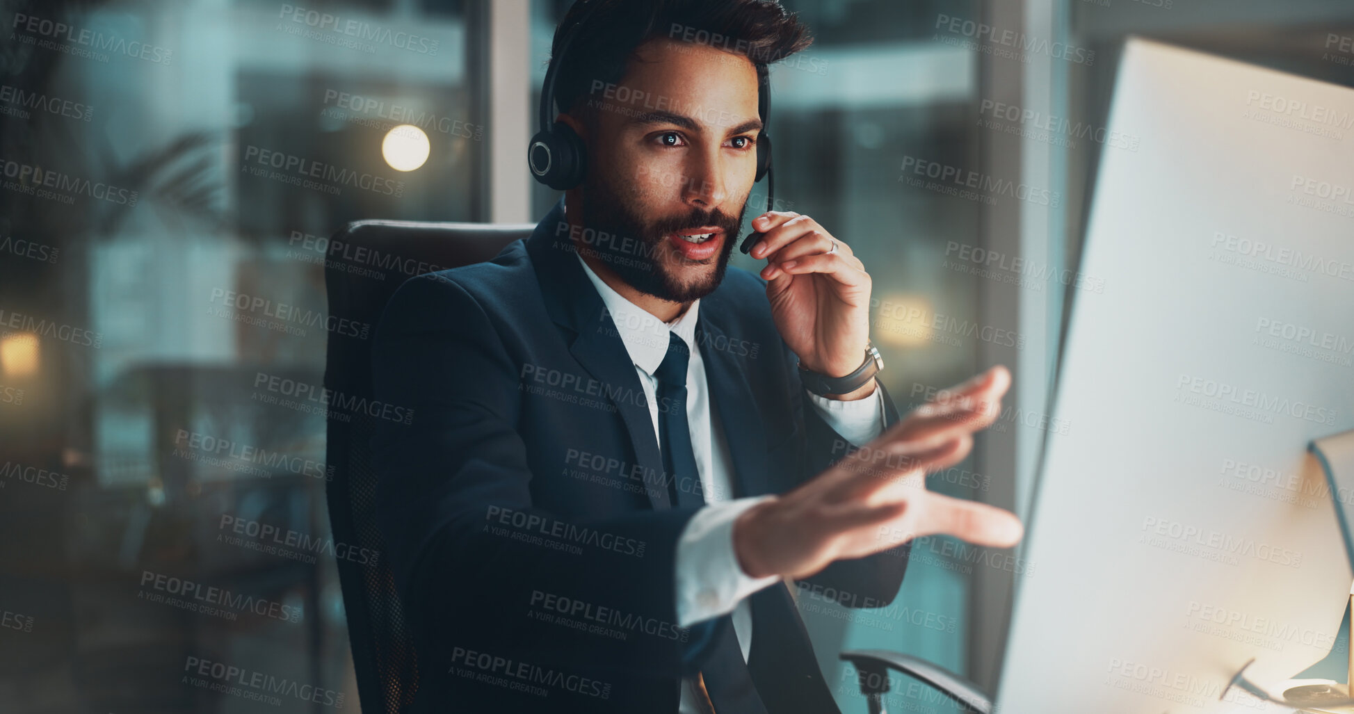 Buy stock photo Call center, computer and man in office at night for international technical support consultation online. Headset, tech and male customer service agent with multilingual translation for global client