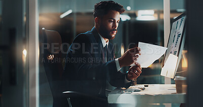 Buy stock photo Night, man and paper at computer for business, research and reading report presentation plan with stats on screen. Accountant, tech and document in dark office with results for company finance growth