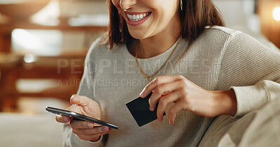 Buy stock photo Woman, phone and credit card with hands on couch for online shopping, digital payment or internet banking in home. Girl, person and smartphone for debit purchase, electronic transaction and ecommerce