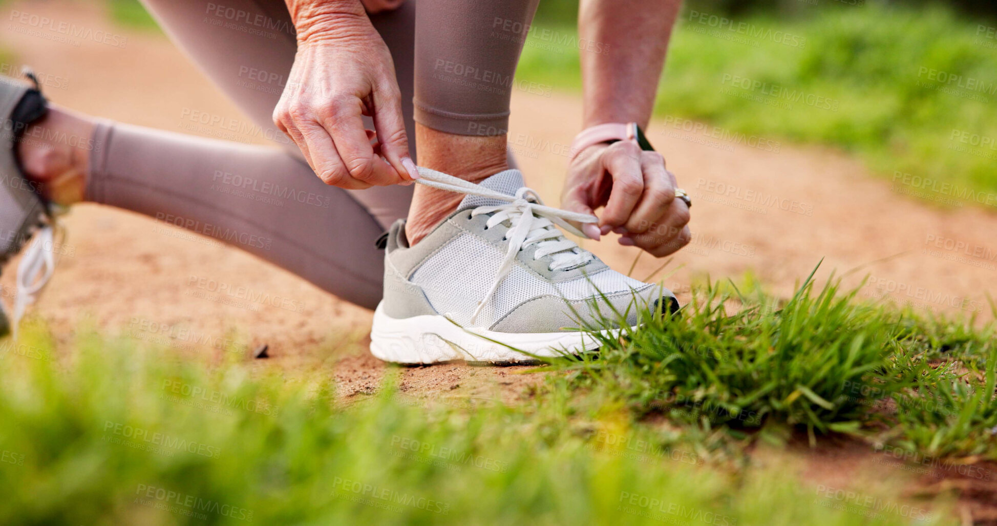 Buy stock photo Fitness, hands and person tying laces in nature for running, workout or training for marathon. Shoes, outdoor and closeup of athlete preparing for cardio, sports or endurance exercise in park.