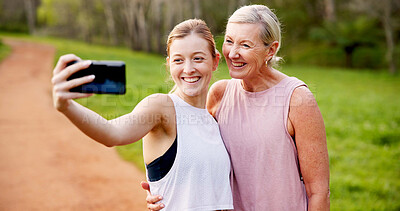 Buy stock photo Mother, daughter and smile with selfie in nature for hiking adventure, profile picture update and social media post. Happy family, woman and girl with photography in forest for cardio workout or walk