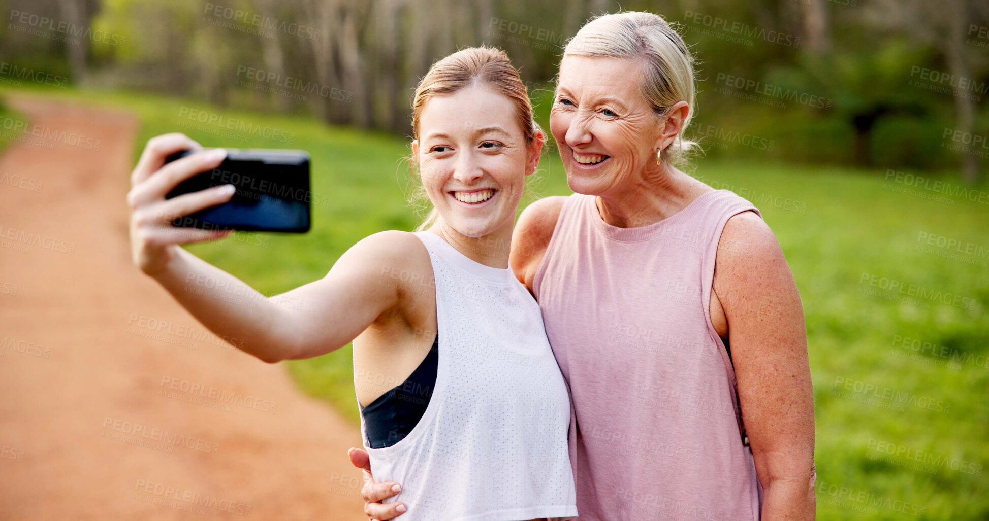 Buy stock photo Mother, daughter and smile with selfie in nature for hiking adventure, profile picture update and social media post. Happy family, woman and girl with photography in forest for cardio workout or walk