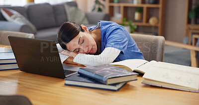 Buy stock photo Nurse, sleeping and tired on table with laptop, burnout and exhausted with medical research. Woman, healthcare student and resting in home with tech, books and fatigue with break for mental health